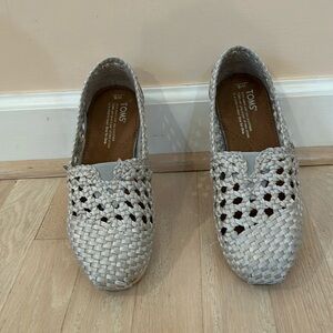 TOMS silver woven shoes.